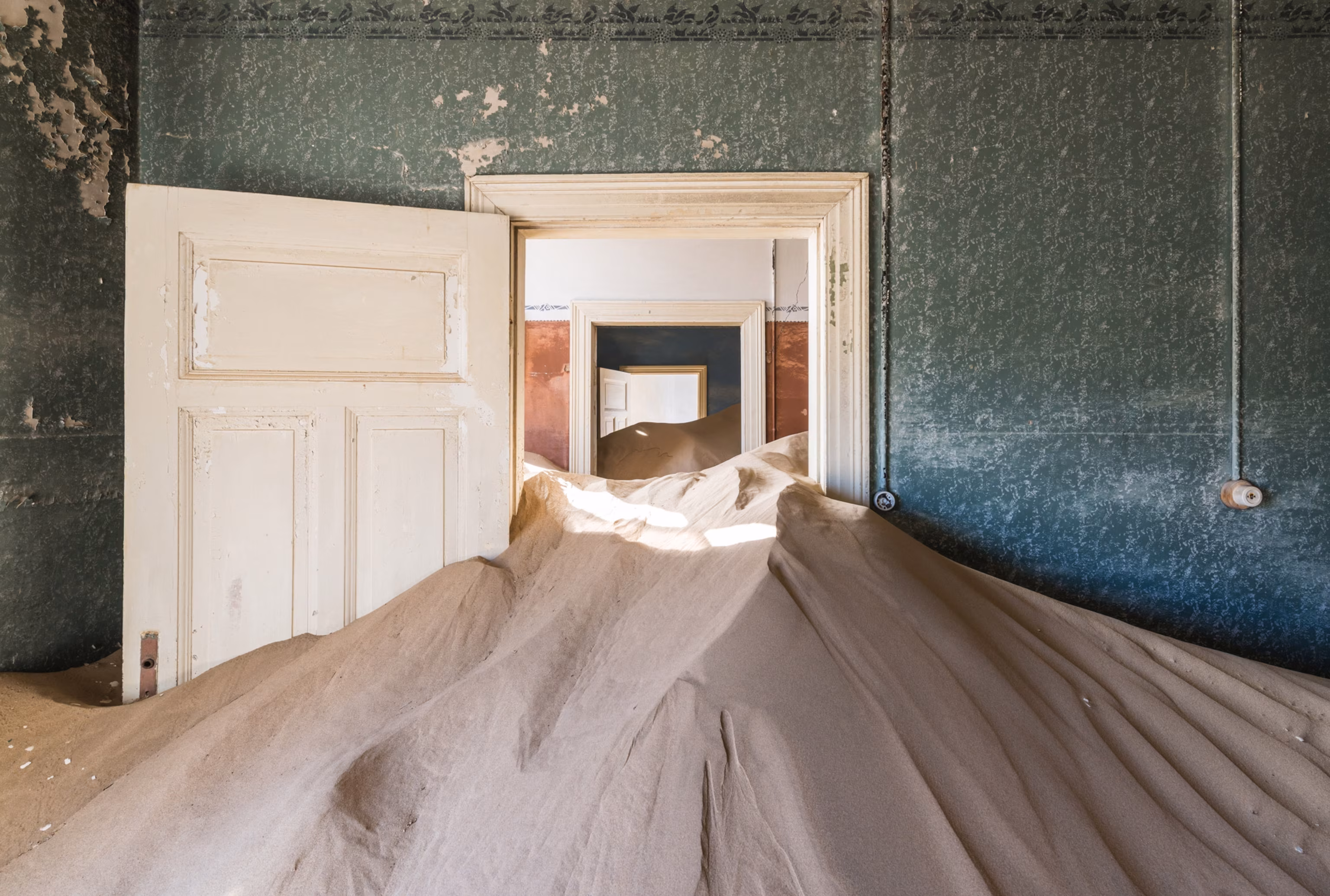 Kolmanskop ghost town house with sand